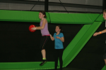 Three Girls Playing Trampoline Dodgeball